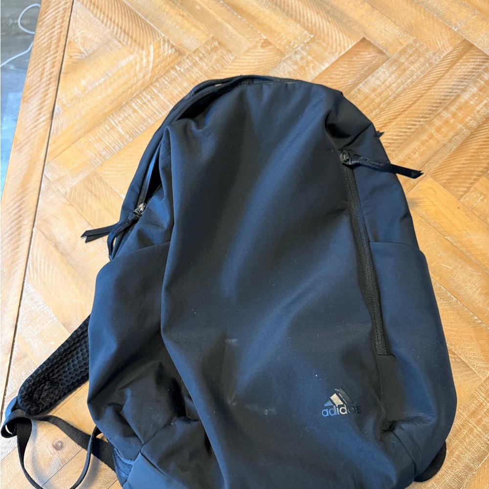 Adidas Sleek Black Lightweight Backpack with Front Zip